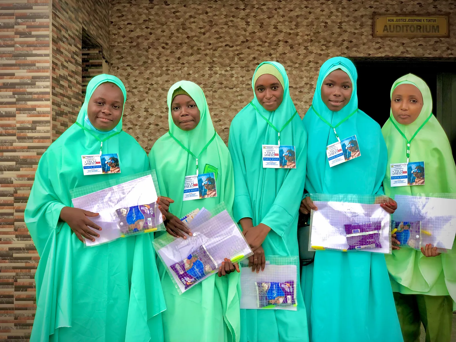Girls in a community gathering supported by SheRise