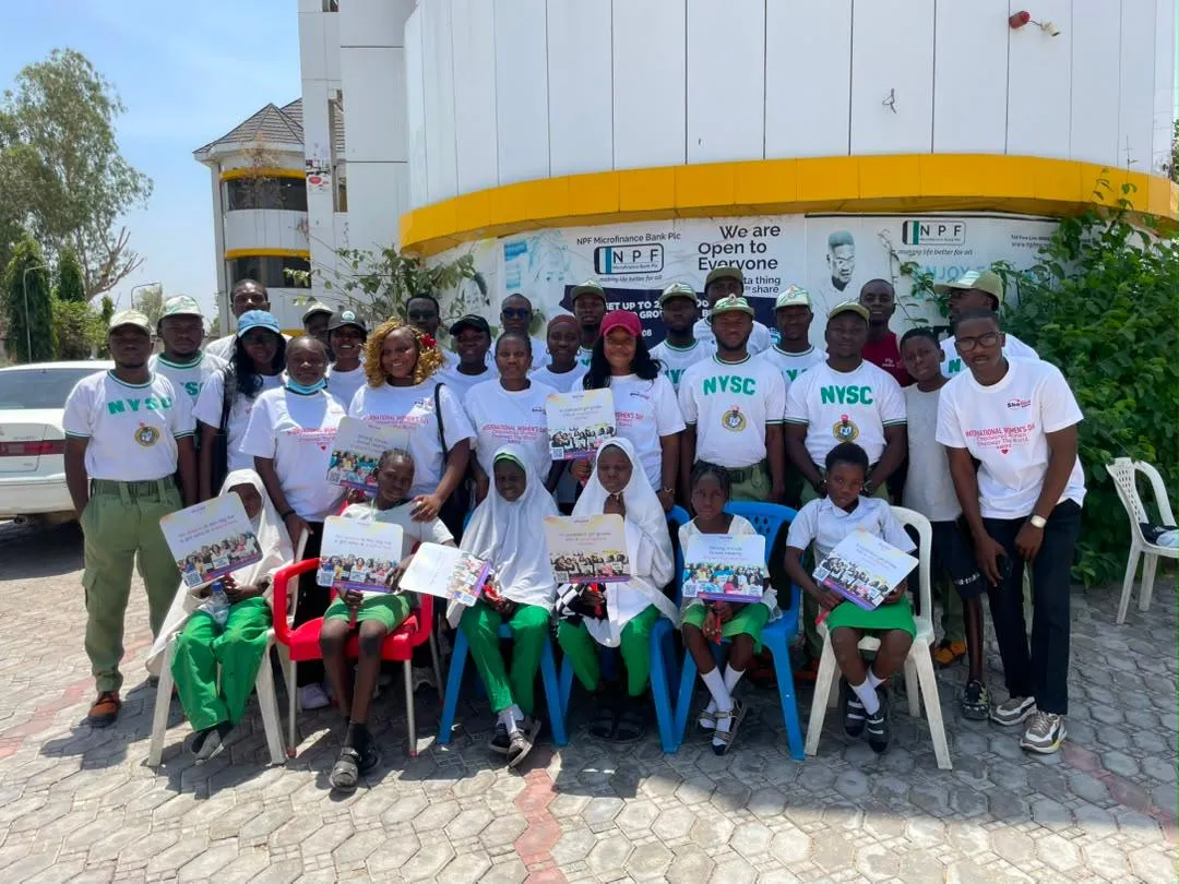 Youth corps members participating in a SheRise economic empowerment initiative
